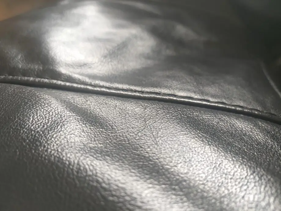 DFS Black Genuine leather.