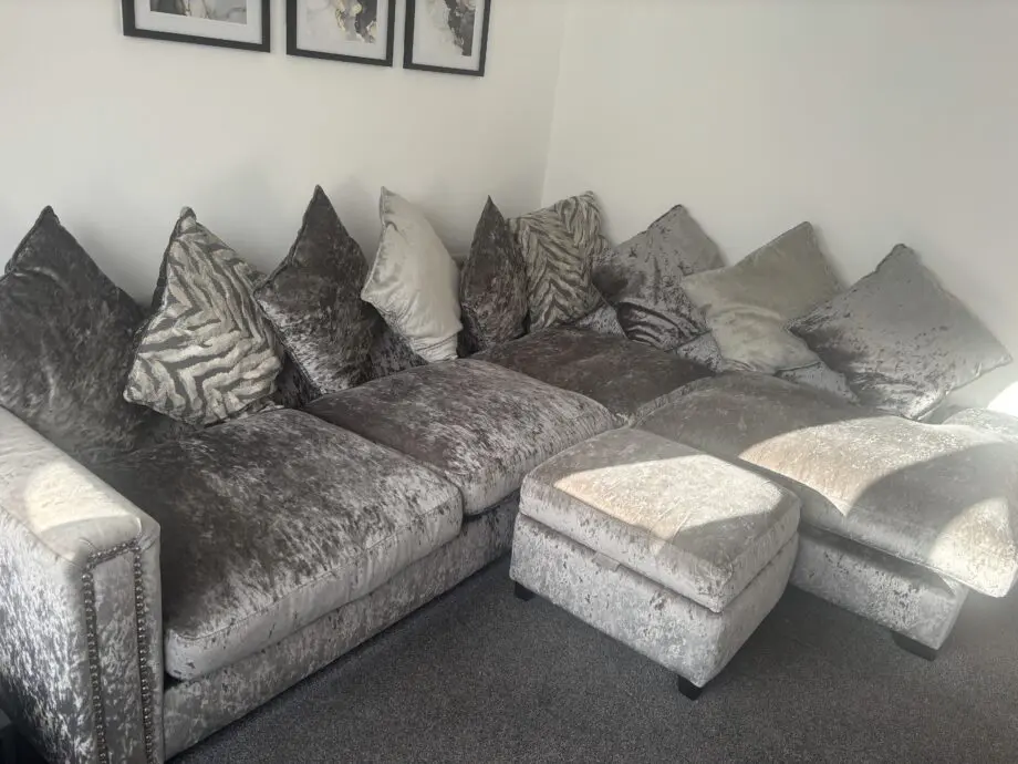 DFS crushed velvet corner sofa with matching ottoman