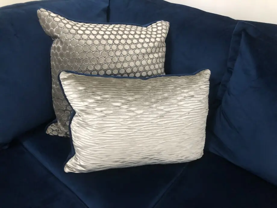 Blue velour 3 seater corner sofa with matching footstool