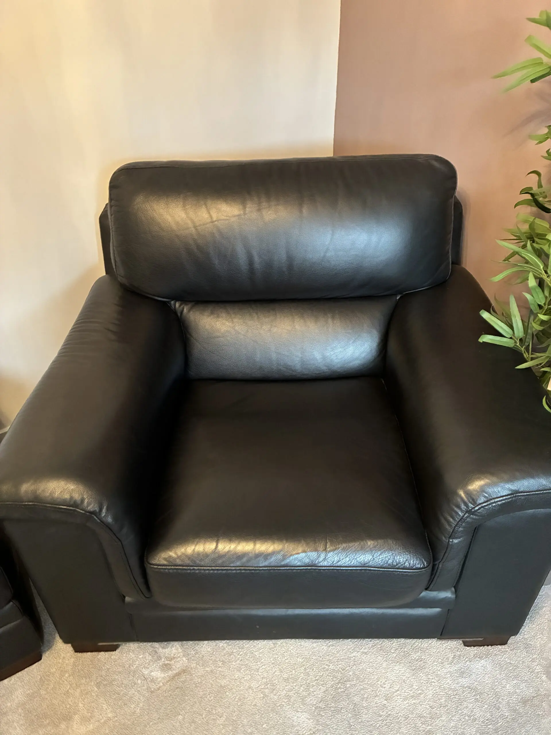 Harvey’s Black Leather Arm Chairs (x2) and Matching Foot Stool - Excellent Condition