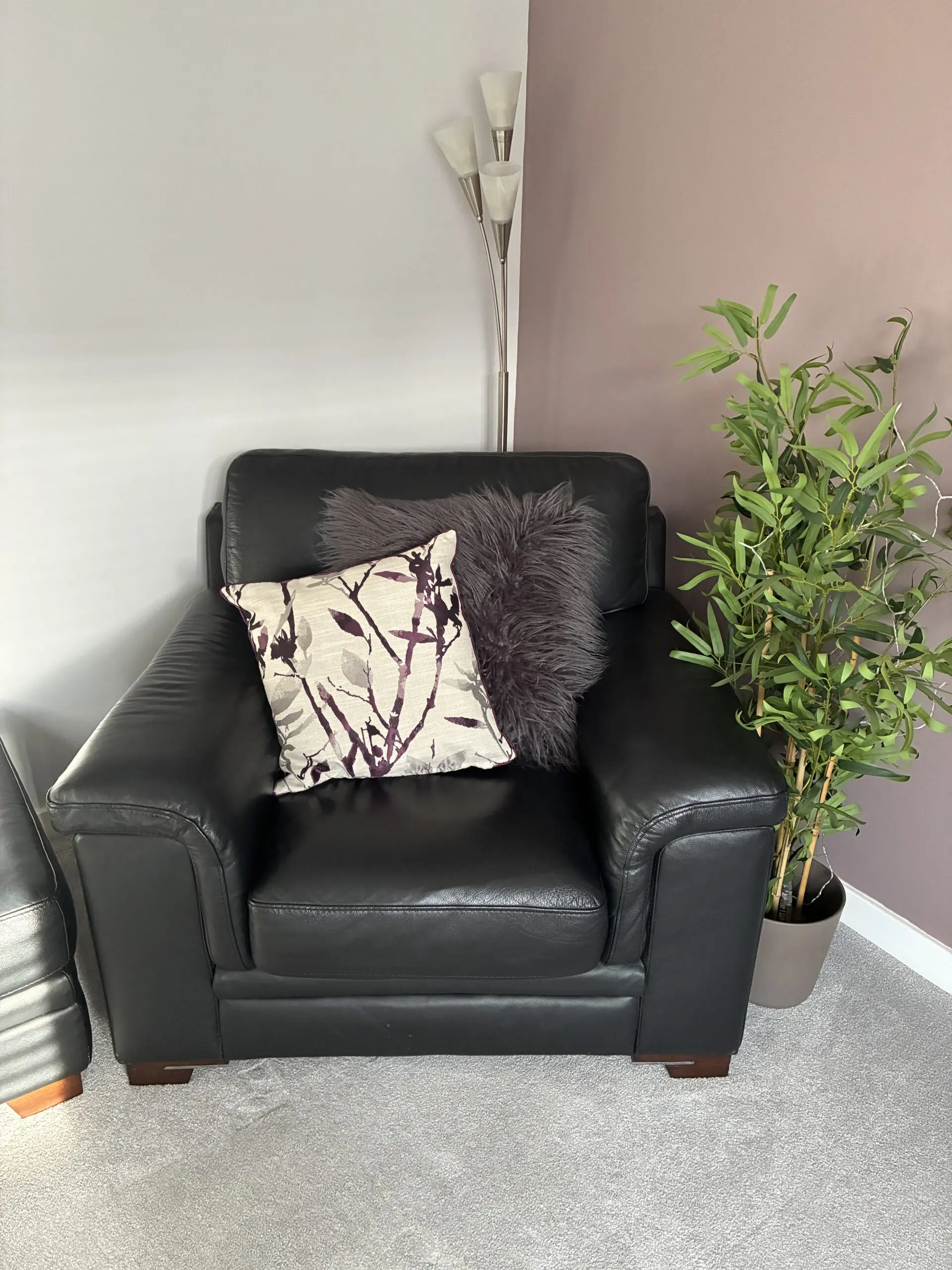 Harvey’s Black Leather Arm Chairs (x2) and Matching Foot Stool - Excellent Condition