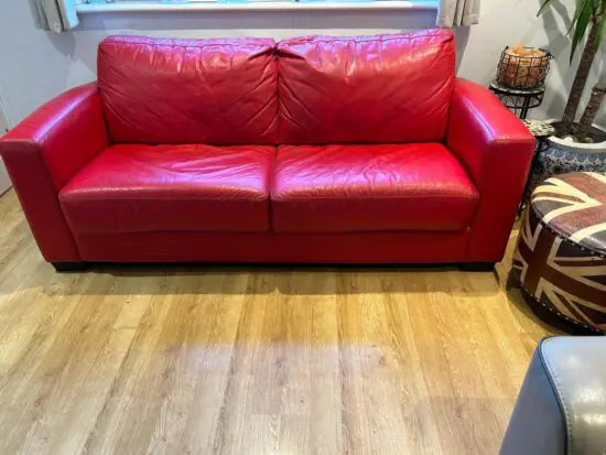 Red leather sofa bed