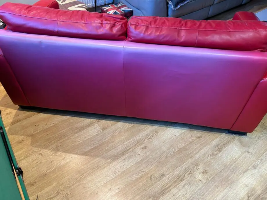Red leather sofa bed