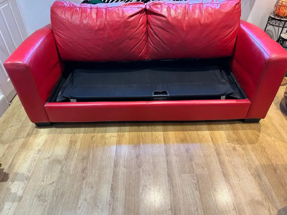 Red leather sofa bed