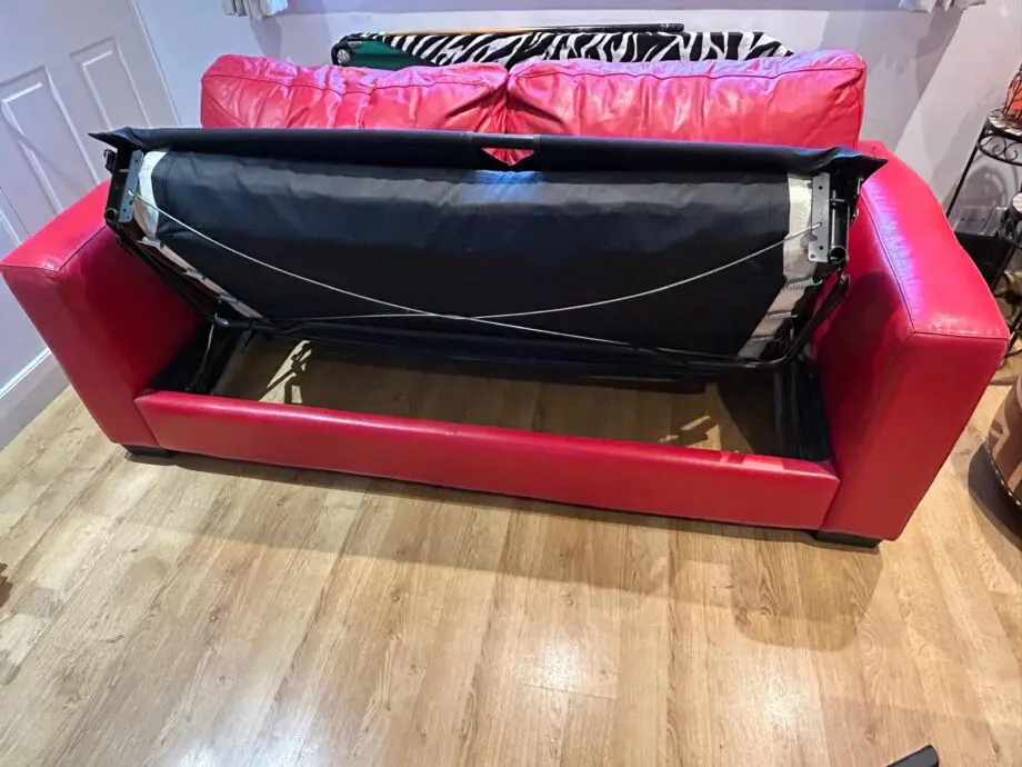 Red leather sofa bed