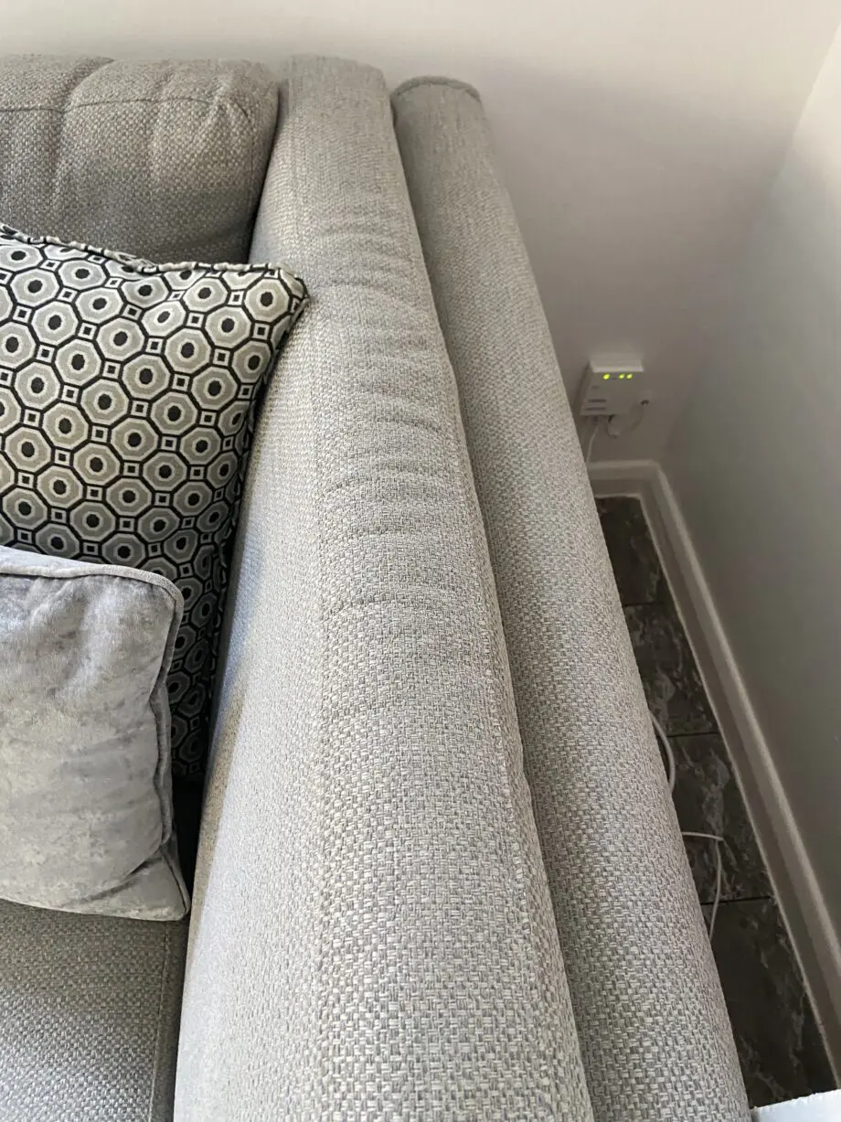 Grey fabric sofa, swivel chair and footstoll