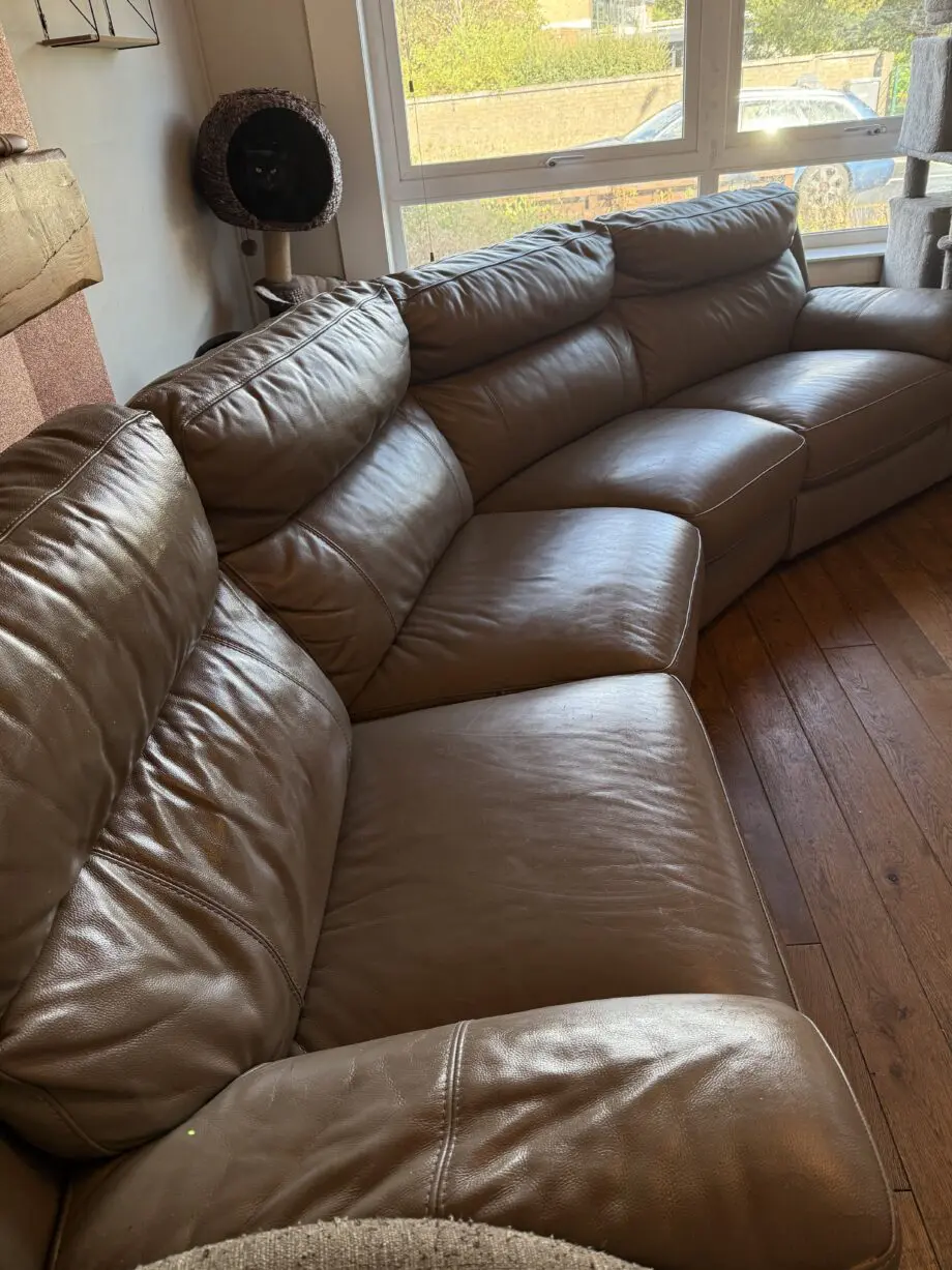 DFS Navigate tanned curved sofa