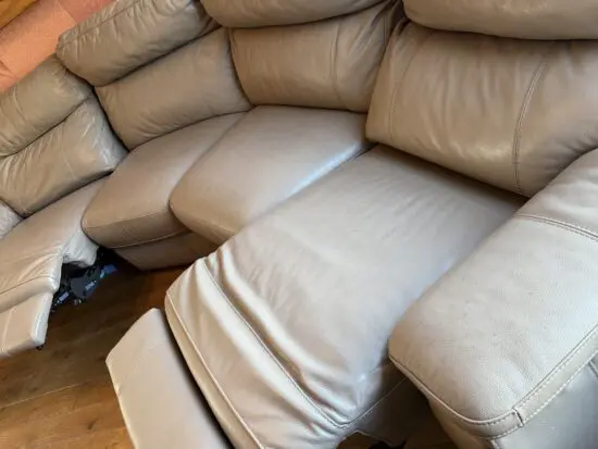 DFS Navigate tanned curved sofa