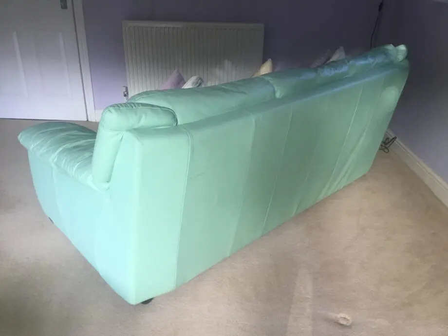 Two ‘Land of Leather’ green matching Italian leather 3 seater sofas