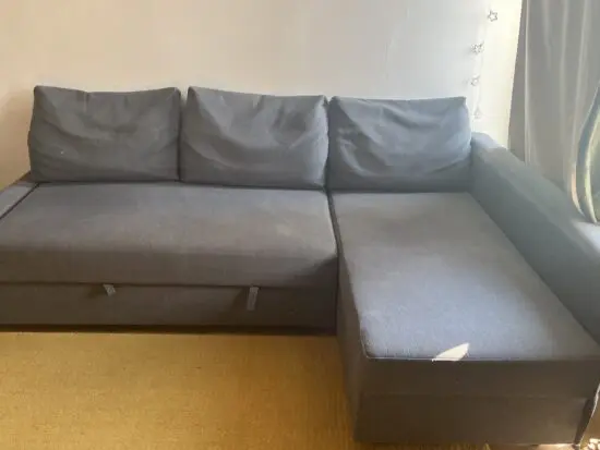 Corner sofa cum bed with storage
