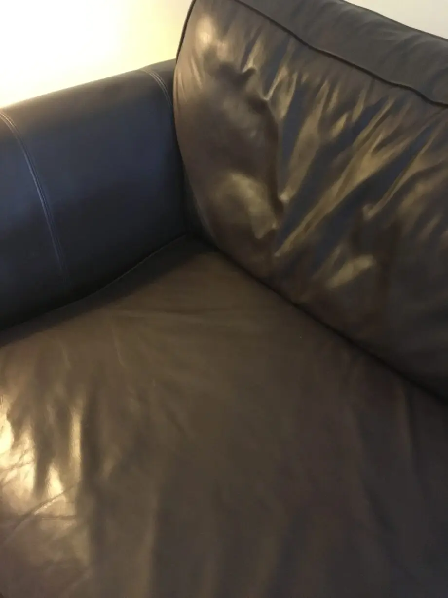 DFS dark brown leather sofa