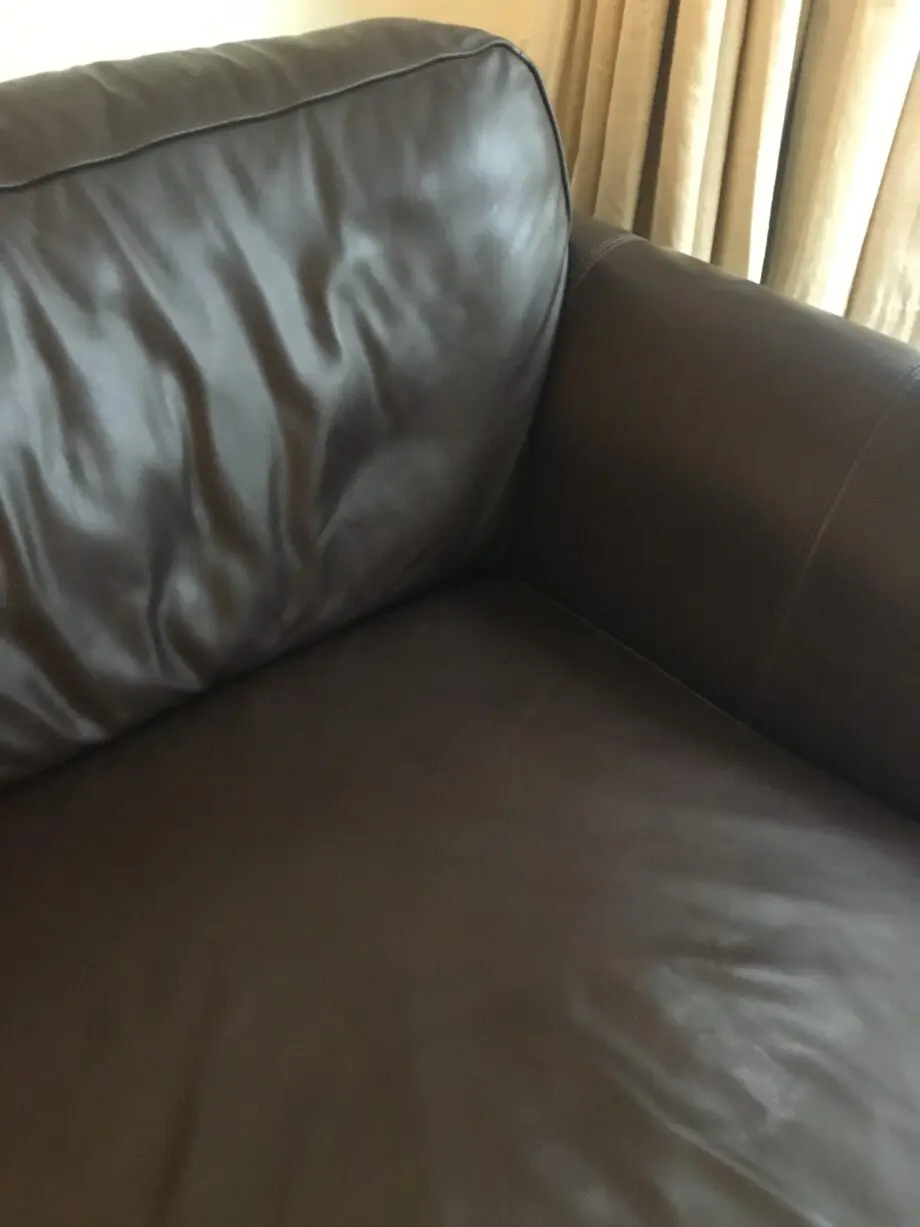 DFS dark brown leather sofa