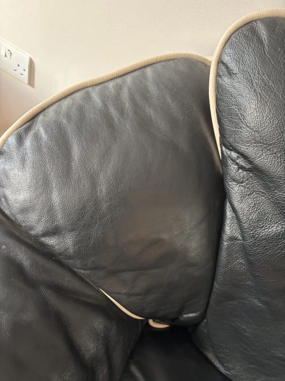 Good conditioned natucci Italian leather sofas black with cream