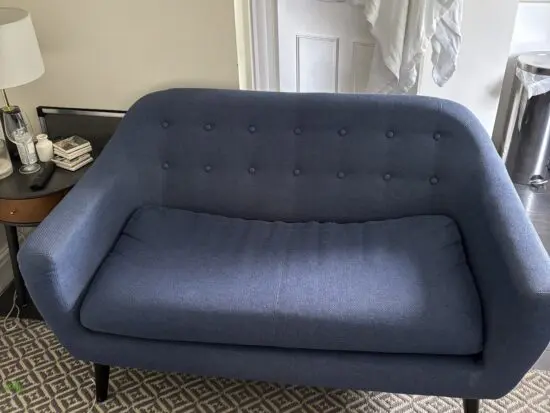 Made Dark Blue 2 seater sofa with black legs