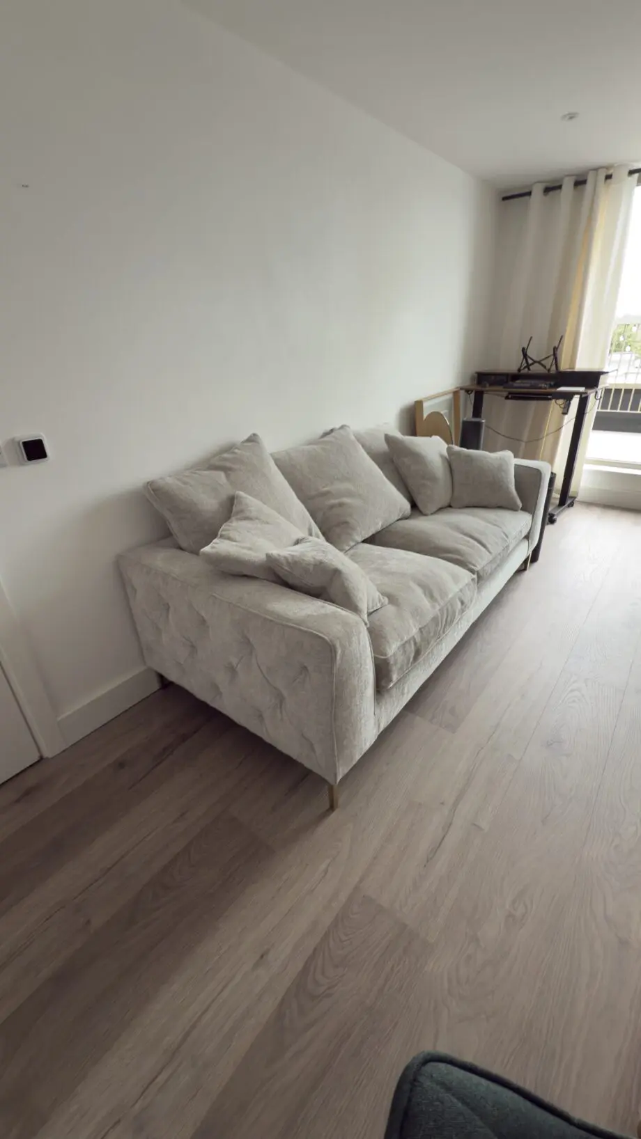 Grey 3 seater sofa, pillow back, foam seat
