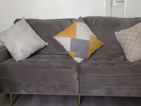 Three seater grey sofa