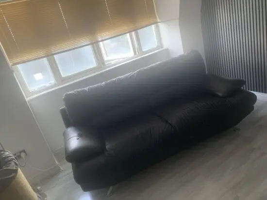 Black leather 3 seater sofa