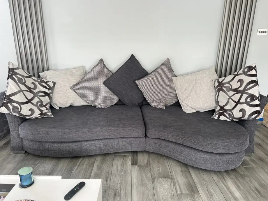 Dfs curved sofa with small chaise on 4 seater sofa and cuddles.
