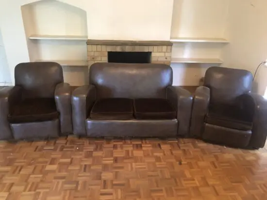 1960s brown pvc leather sofa and matching armchairs