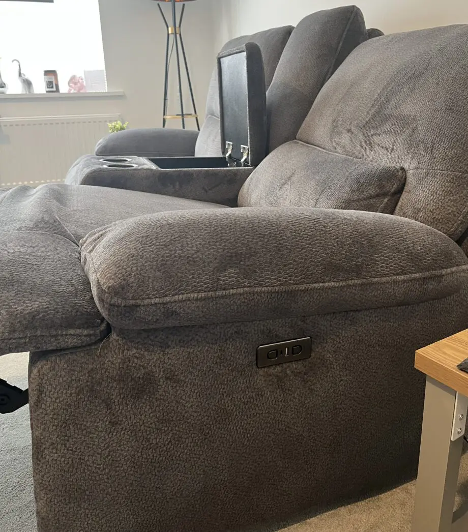 DFS brand new grey 2 seater recliner sofa with console and charging points