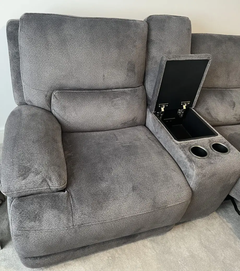 DFS brand new grey 2 seater recliner sofa with console and charging points