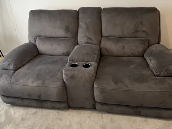 DFS brand new grey 2 seater recliner sofa with console and charging points