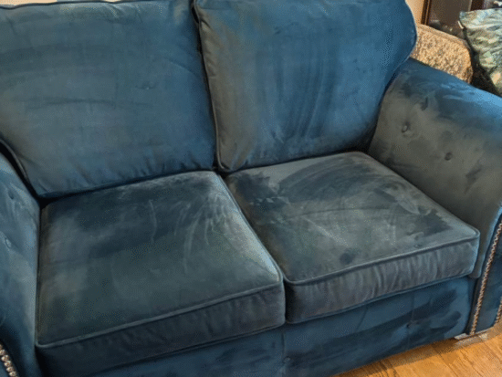 Two seater velvet sofa