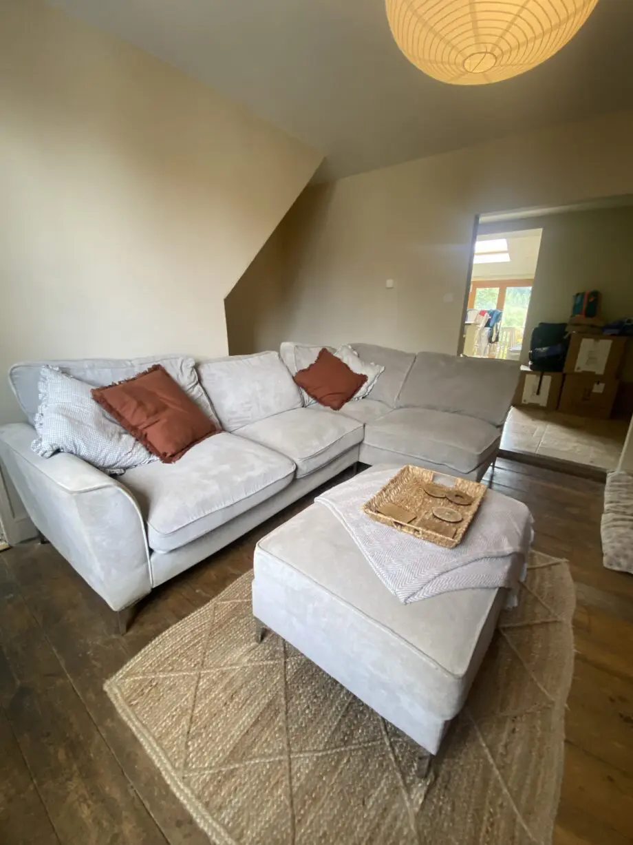 Beige/Grey 4 seater corner cofa with pouffe