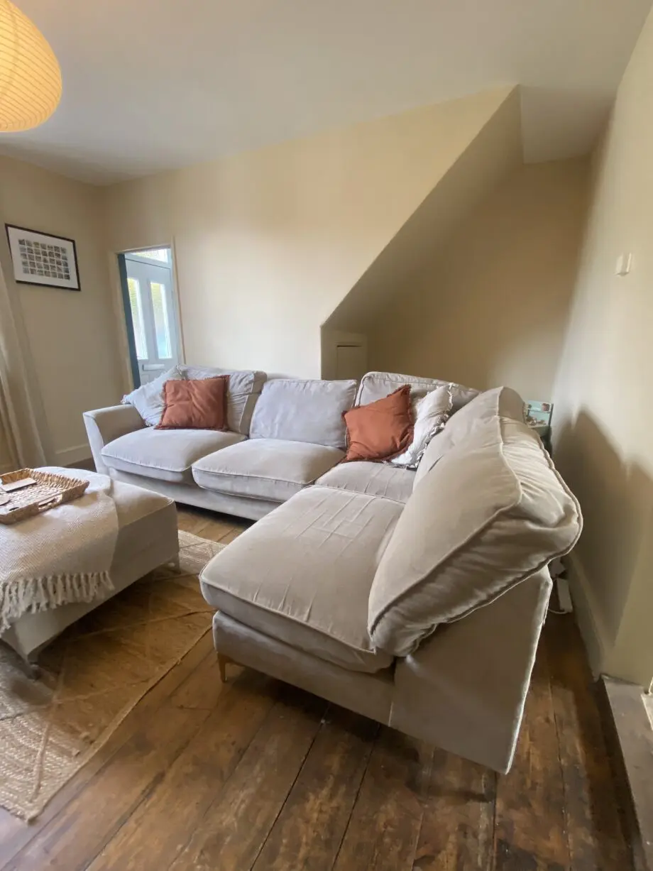 Beige/Grey 4 seater corner cofa with pouffe