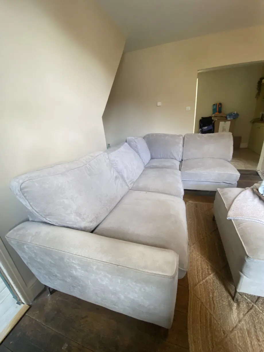 Beige/Grey 4 seater corner cofa with pouffe