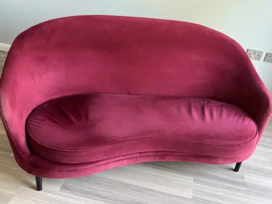3 seater “curved” settee, Libra brand, bought from Fenwick - Light burgundy