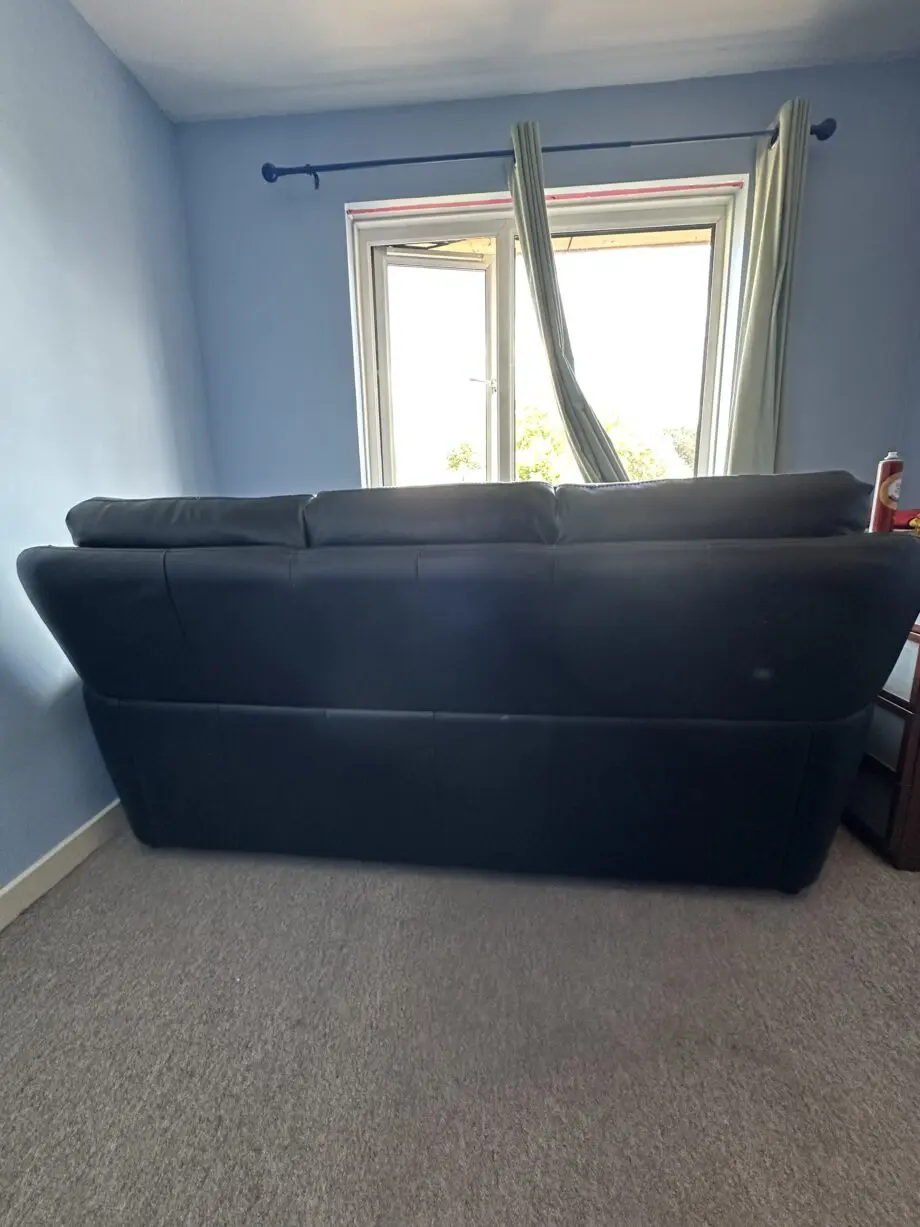 Black leather 3 seater sofa