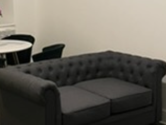 Charcoal grey 2 seater chesterfield sofa