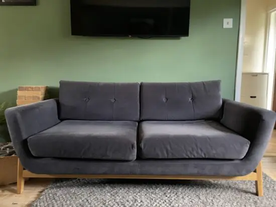Dark grey velvet sofa