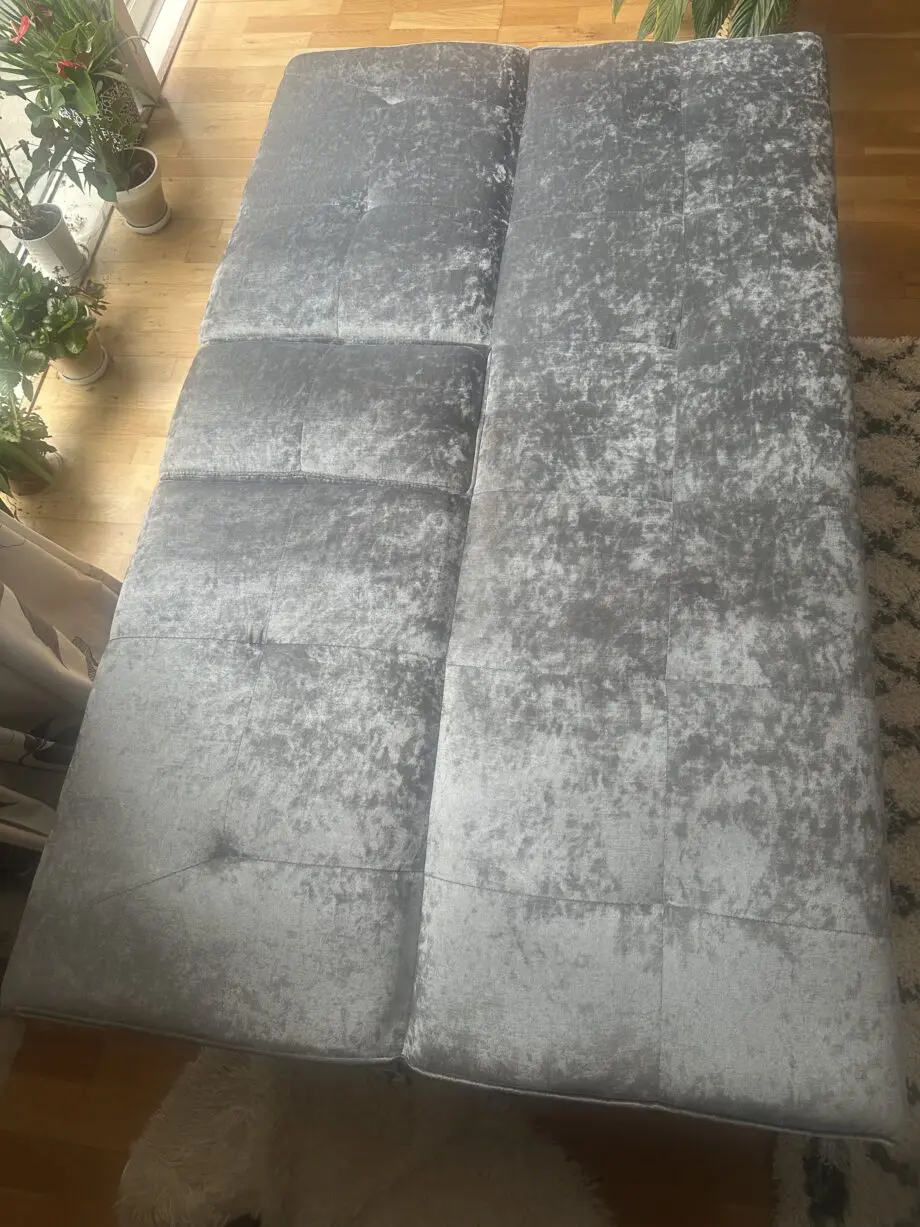 Sofa bed with mug holder and bluetooth speakers