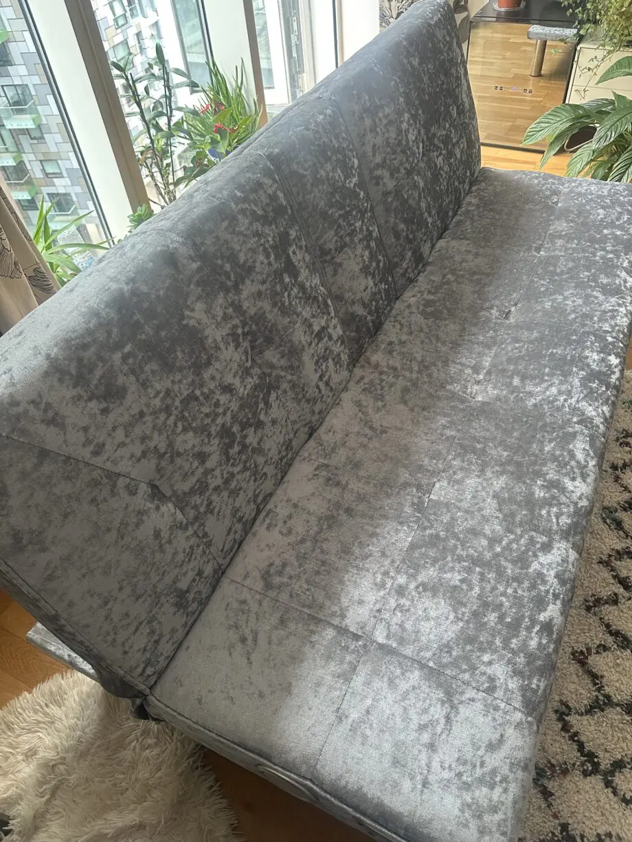 Sofa bed with mug holder and bluetooth speakers