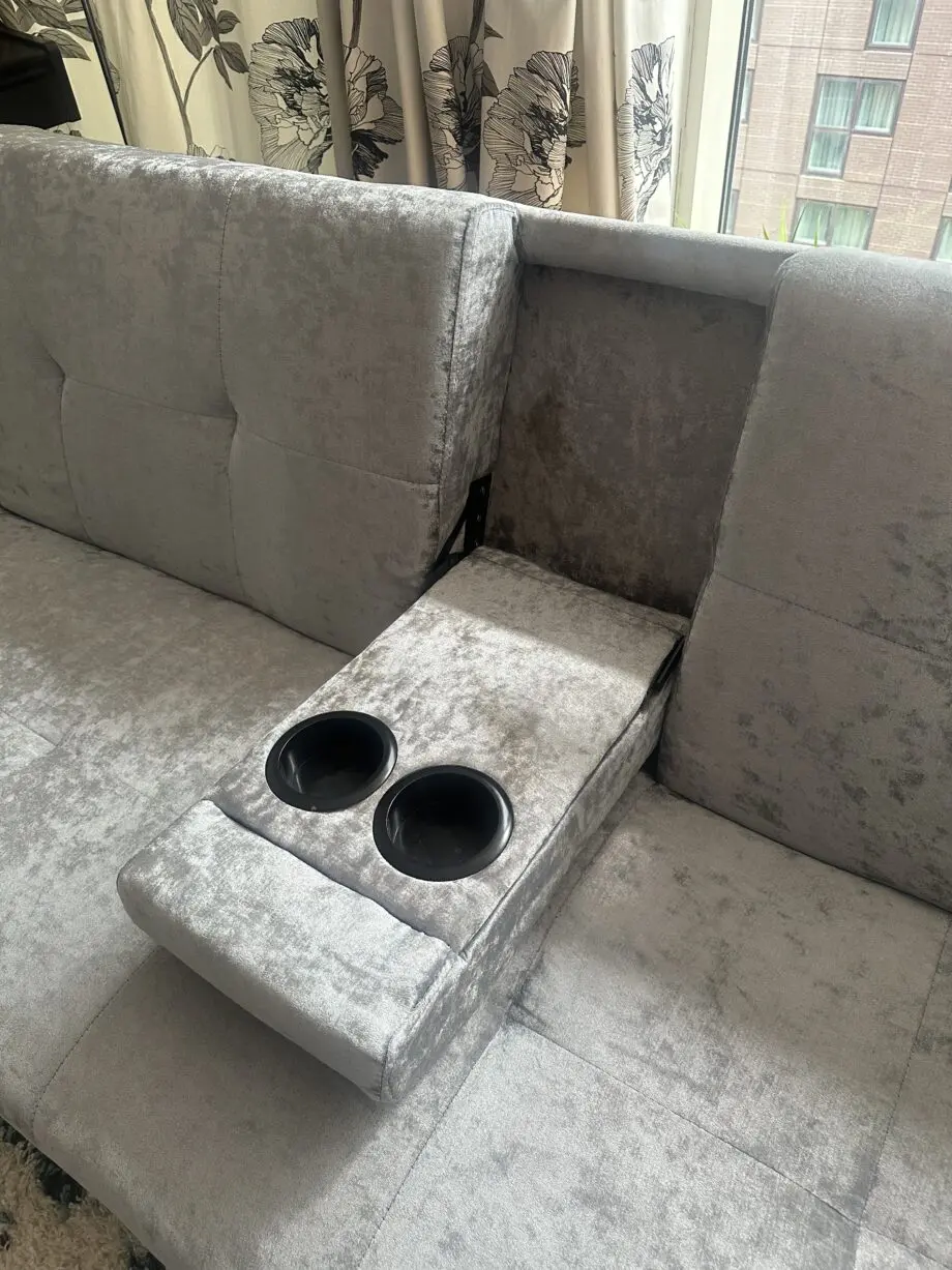 Sofa bed with mug holder and bluetooth speakers