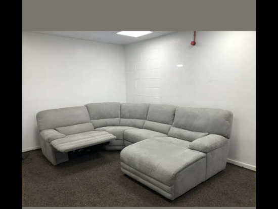 Light grey Harvey's Kneller corner recliner sofa