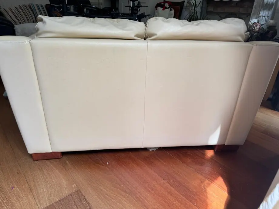 Cream real leather Otium Italian manufactured two seat sofa