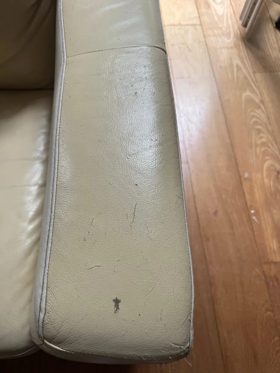 Cream real leather Otium Italian manufactured two seat sofa