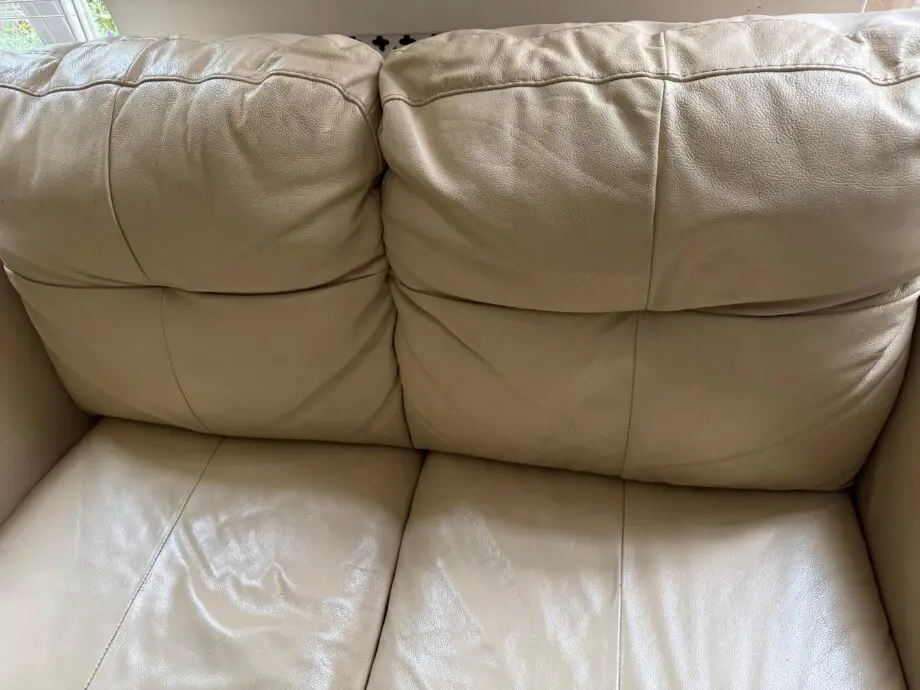 Cream real leather Otium Italian manufactured two seat sofa