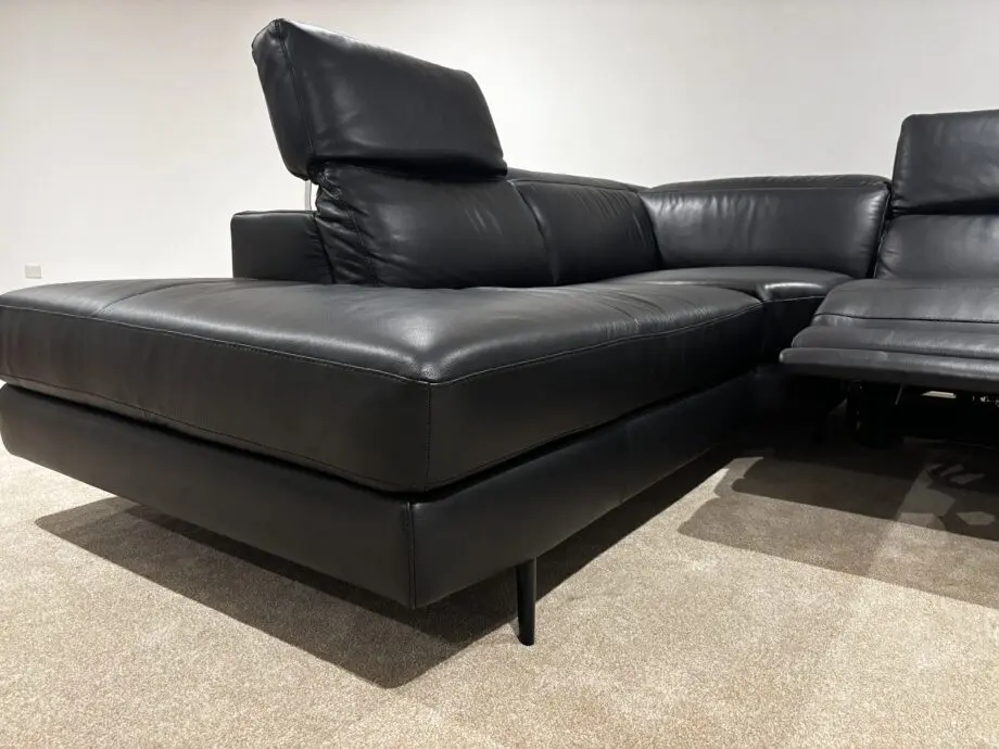 Nattuzzi black 2 electric recliners 1 month old corner sofa