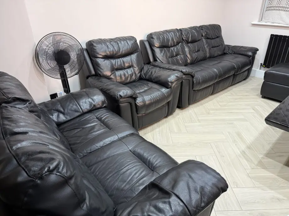 DFS Black Reclining Leather Sofa Set of 3 and Storage Stool