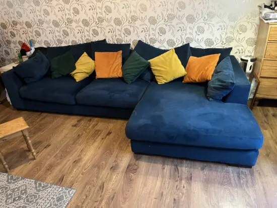 DFS blue velvet corner sofa