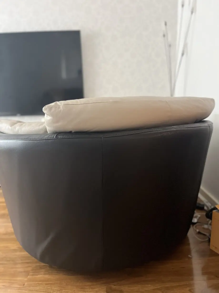 DFS beige swivel chair sofa