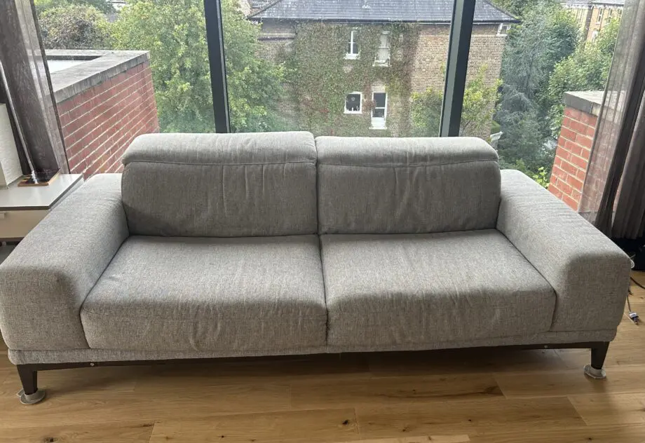 Natuzzi 2 Seater fabric grey sofa
