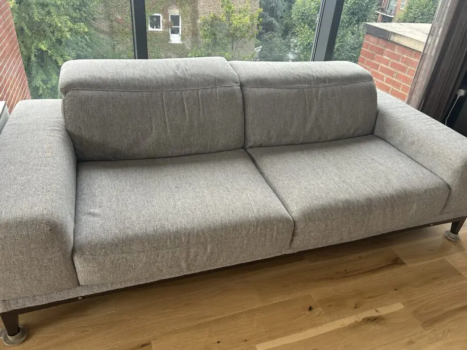 Natuzzi 2 Seater fabric grey sofa