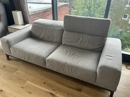 Natuzzi 2 Seater fabric grey sofa