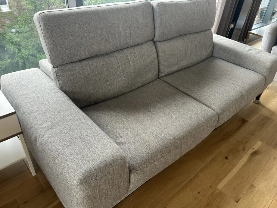 Natuzzi 2 Seater fabric grey sofa