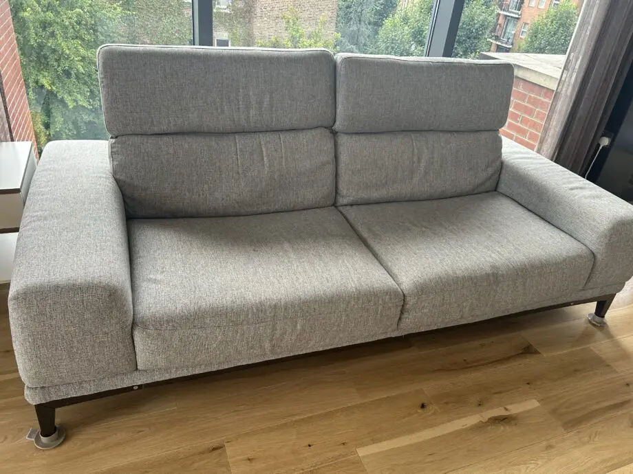 Natuzzi 2 Seater fabric grey sofa